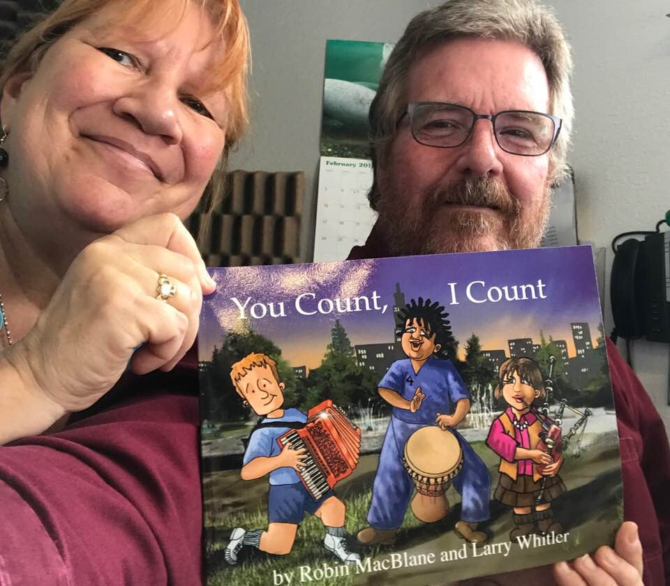 Robin and Larry with You Count I Count book.jpg